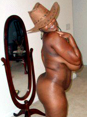 Naked ebony mom posing in front of mirror